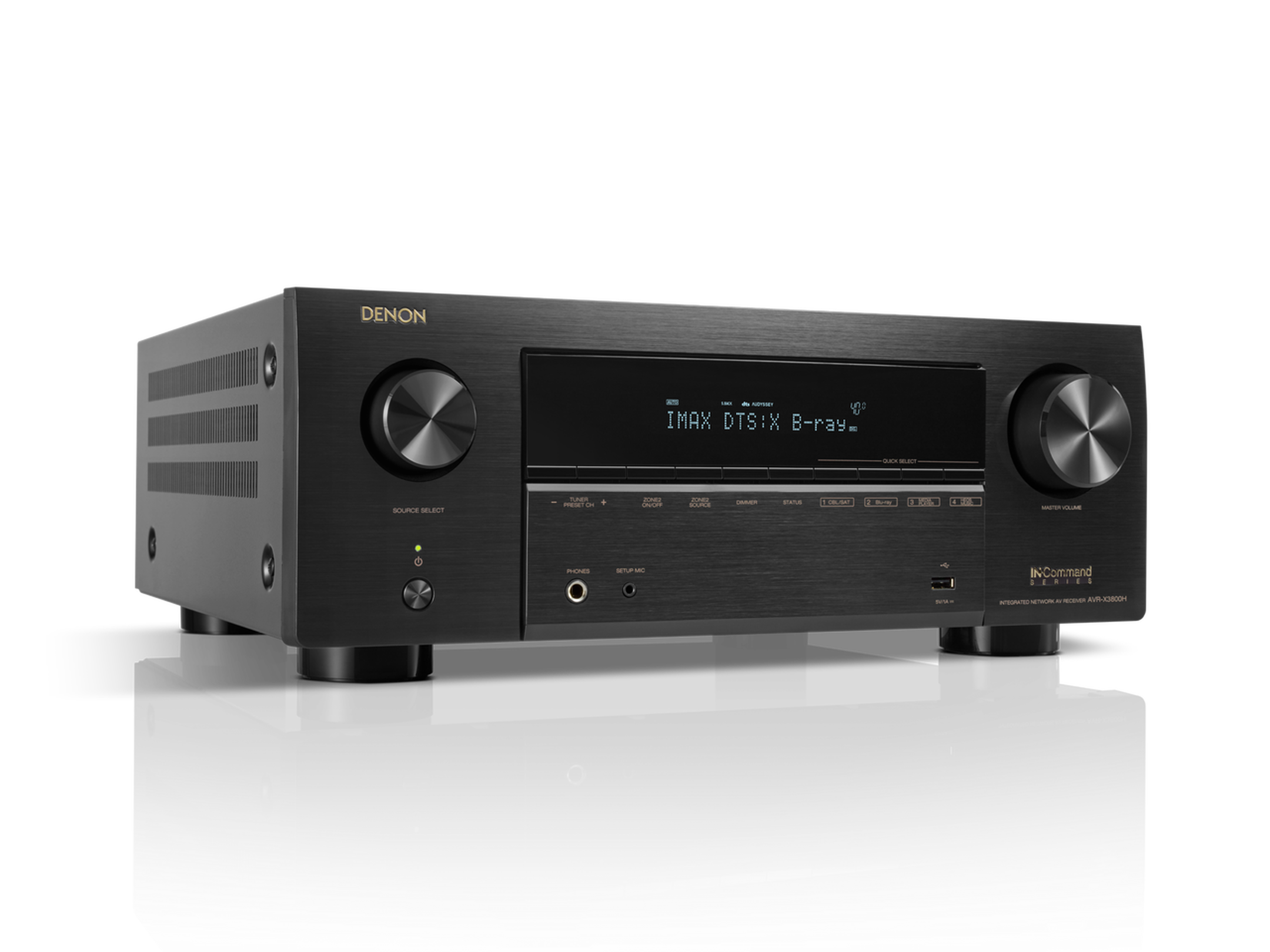 Black Denon audio receiver on a white background