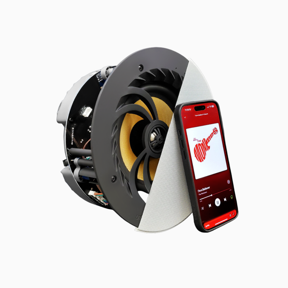 Speaker and smartphone with music app on a white background