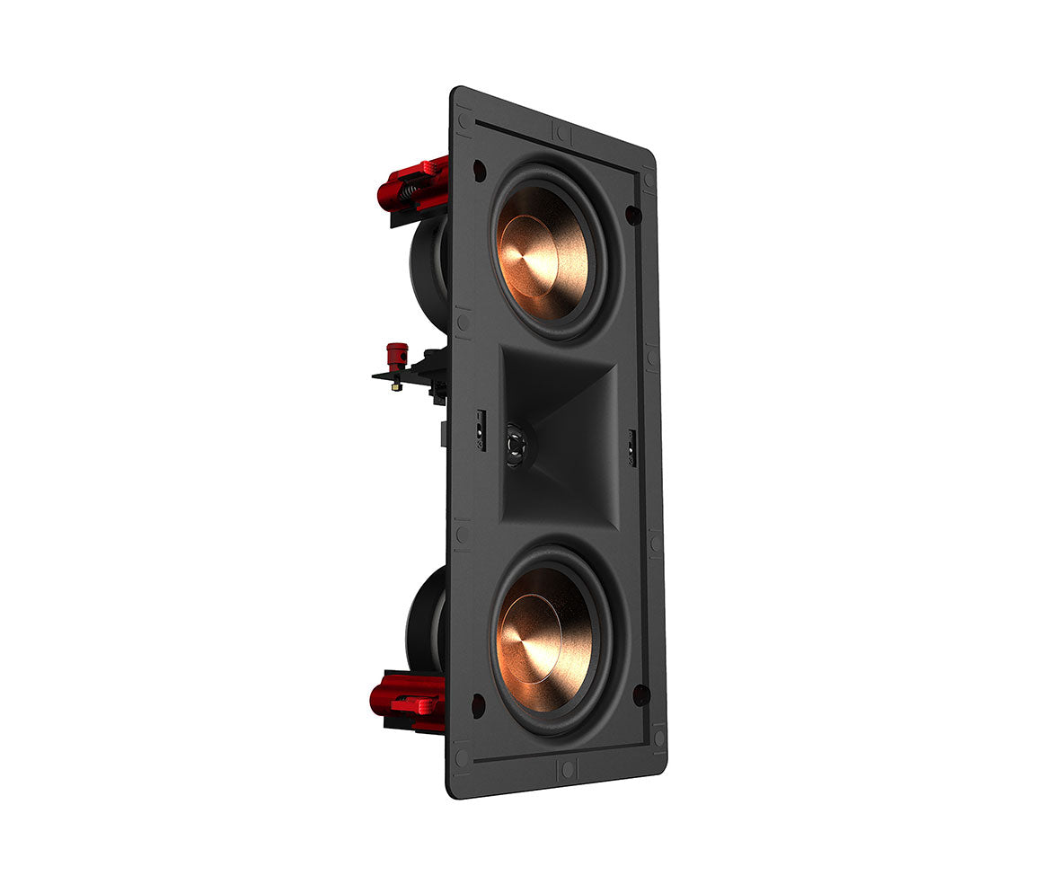 Wall-mounted speaker with metallic cones on a white background
