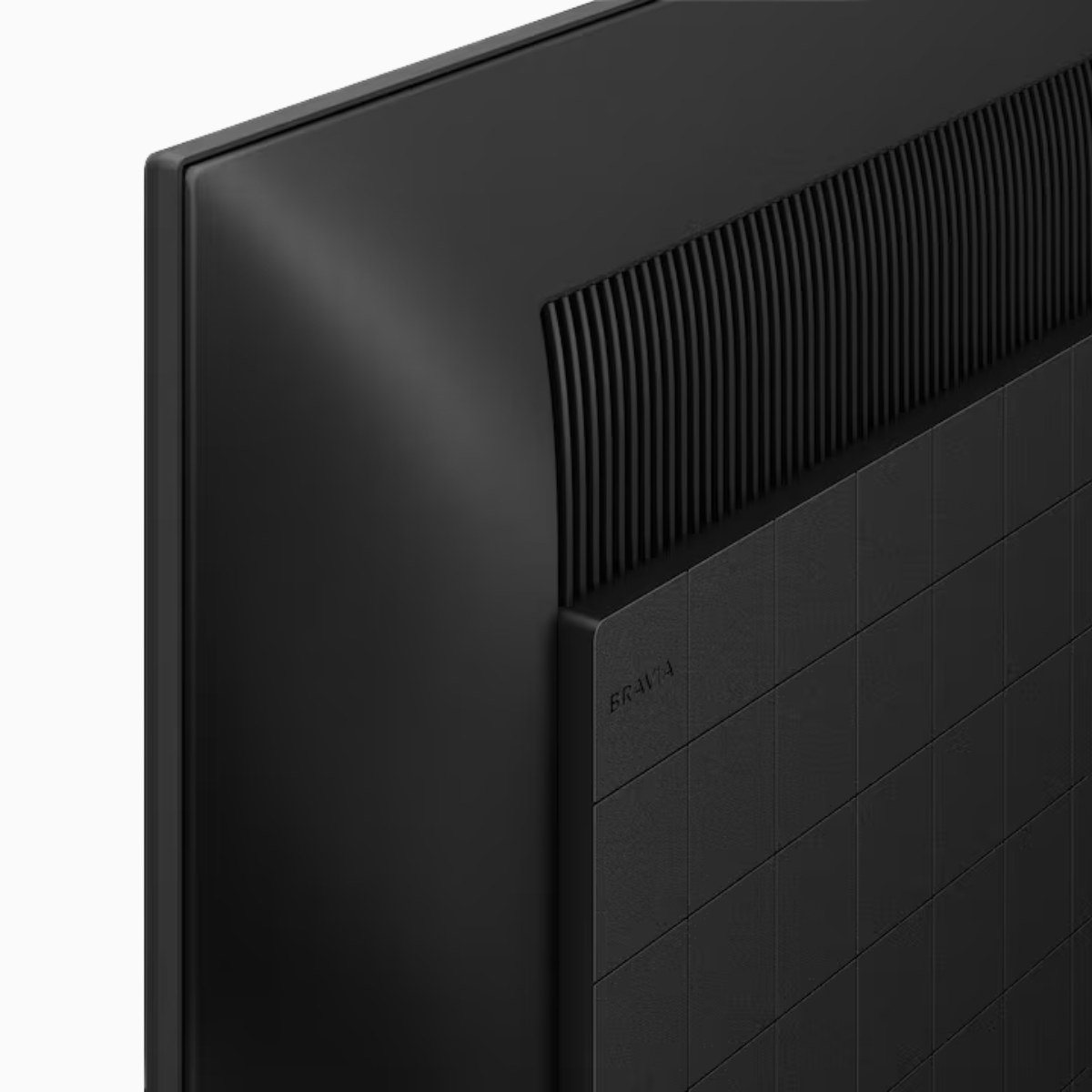 Close-up of a black electronic device with a grid pattern on a white background