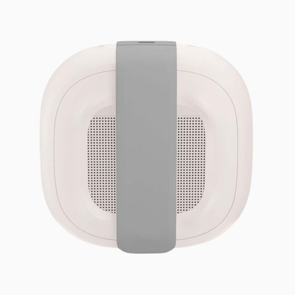 Round white device with a gray strap on a white background