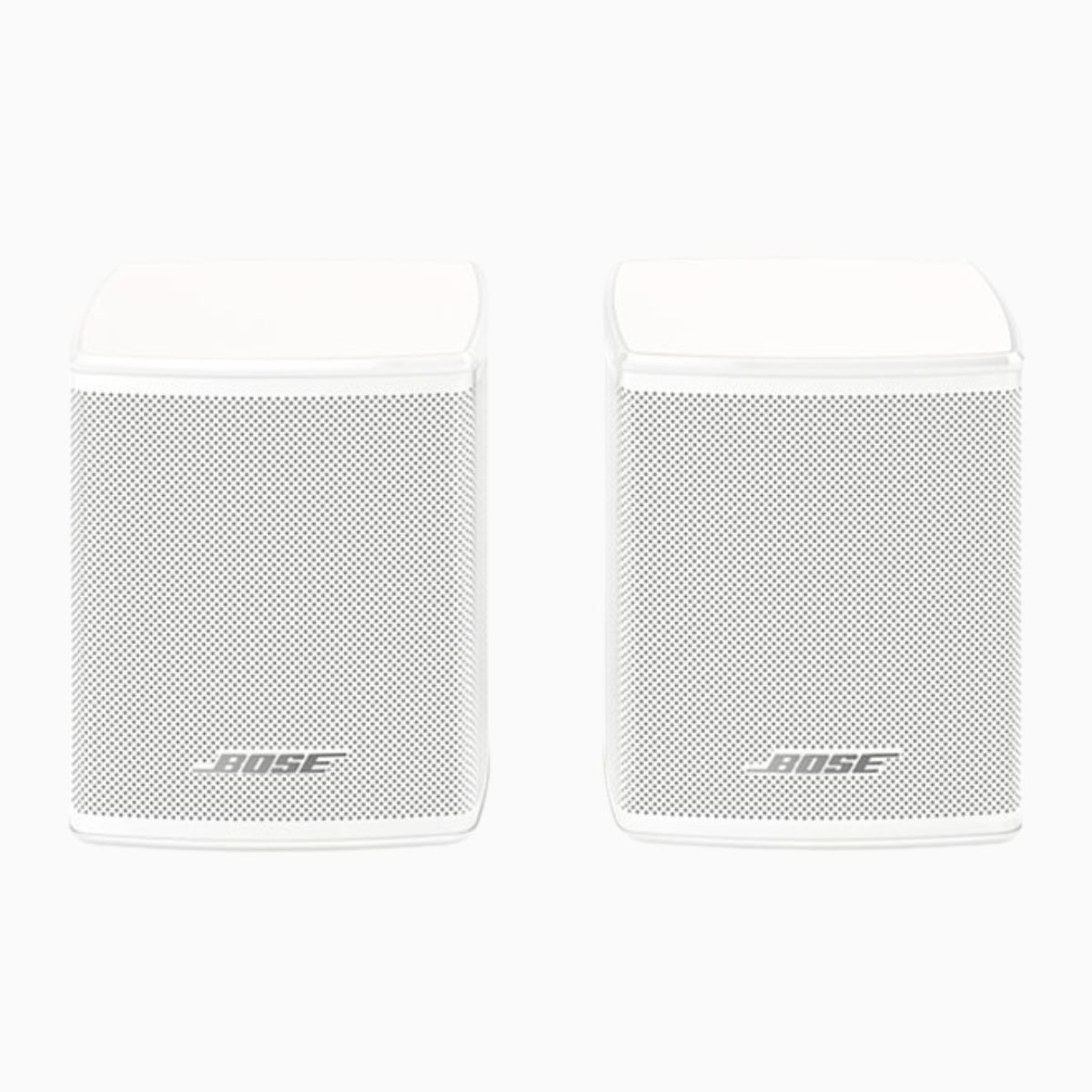 Two white Bose speakers on a white background