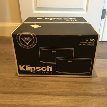 Klipsch Reference speaker box on a wooden floor