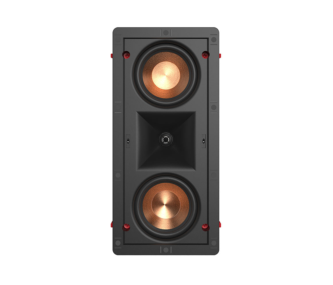 Wall-mounted speaker with copper cones on a white background