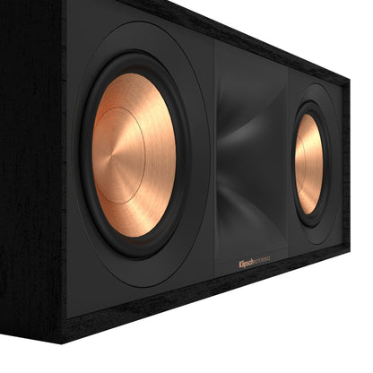 Black speaker with gold cones on a white background