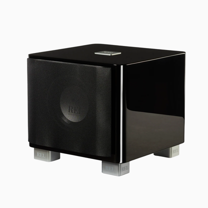 Black audio subwoofer with 'REL' branding on a white background