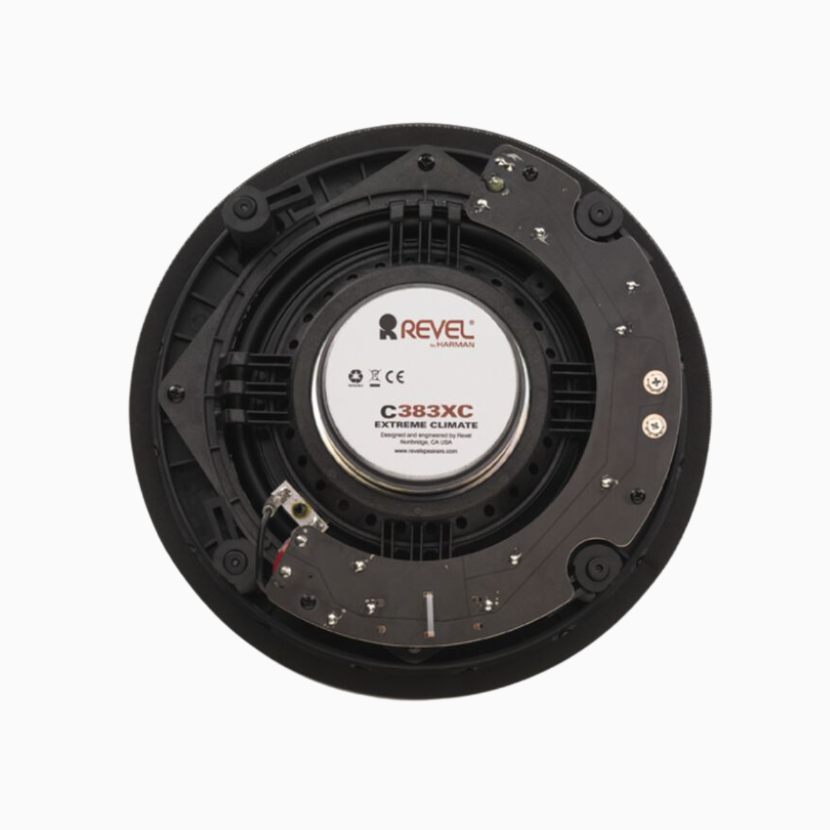 Revel speaker driver on a white background