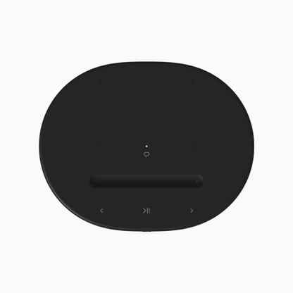 Black circular control panel with buttons on a white background