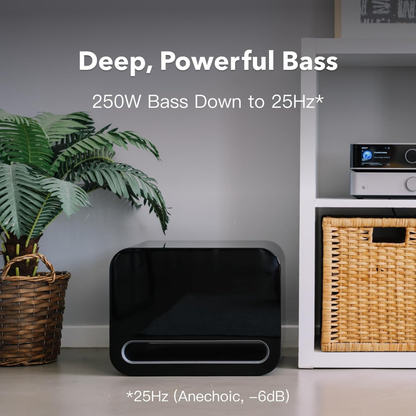 Black speaker on a floor with text about deep, powerful bass in a room setting.