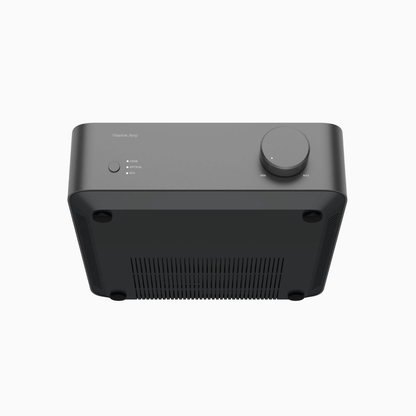 Black electronic device with a circular knob on a white background