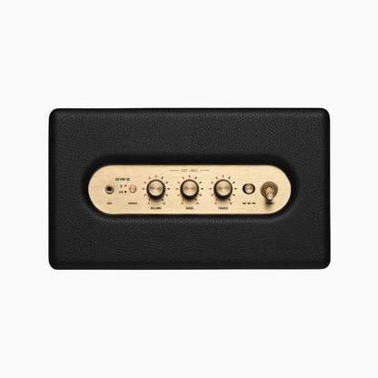 Black electronic device with beige control panel on a white background