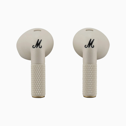 Pair of beige earbuds with a textured design on a white background