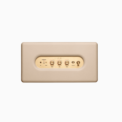 Beige wall-mounted control panel with gold accents on a white background